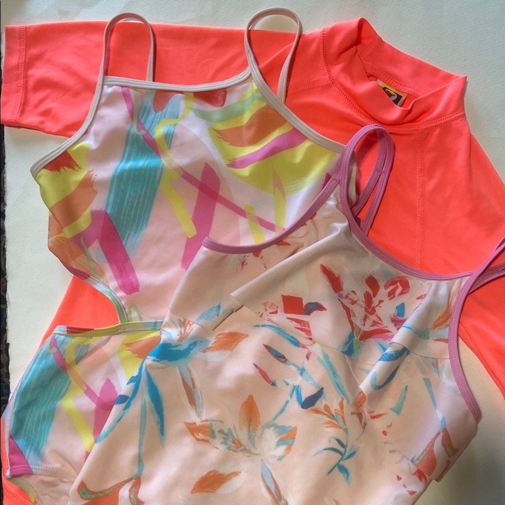 (2) one-piece Swimsuits Size L plus bonus! Roxy rashguard, cute floral patterns